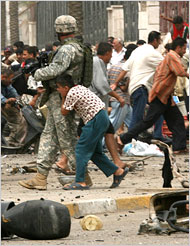 Iraq Boys Hides Behind US Soldier